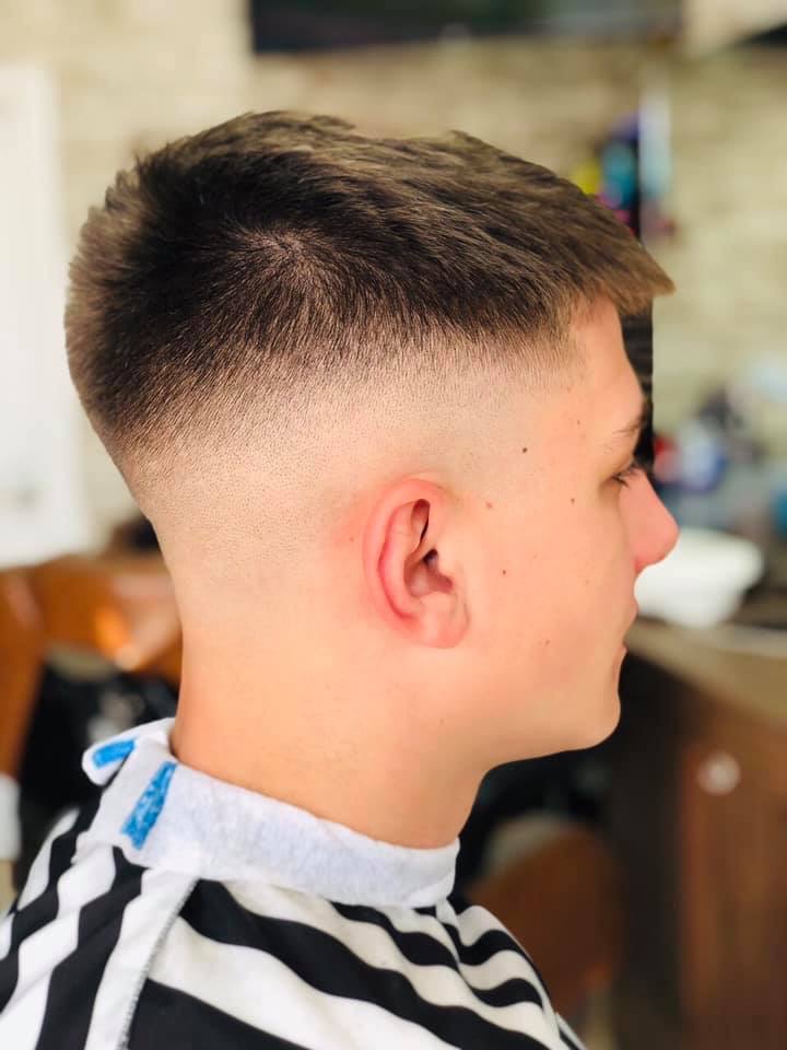 Cleanly blended fade in side profile at Top Fades Barbers